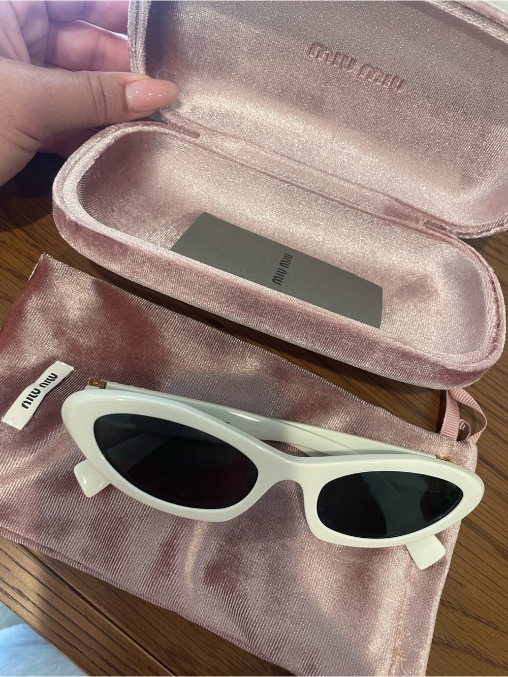 Miu Miu White Cat-Eye Sunglasses with Black Lenses
